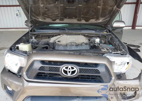 2013 Toyota Tacoma Base V6 z USA, uszkodzony, nr VIN 3TMLU4EN4DM118438